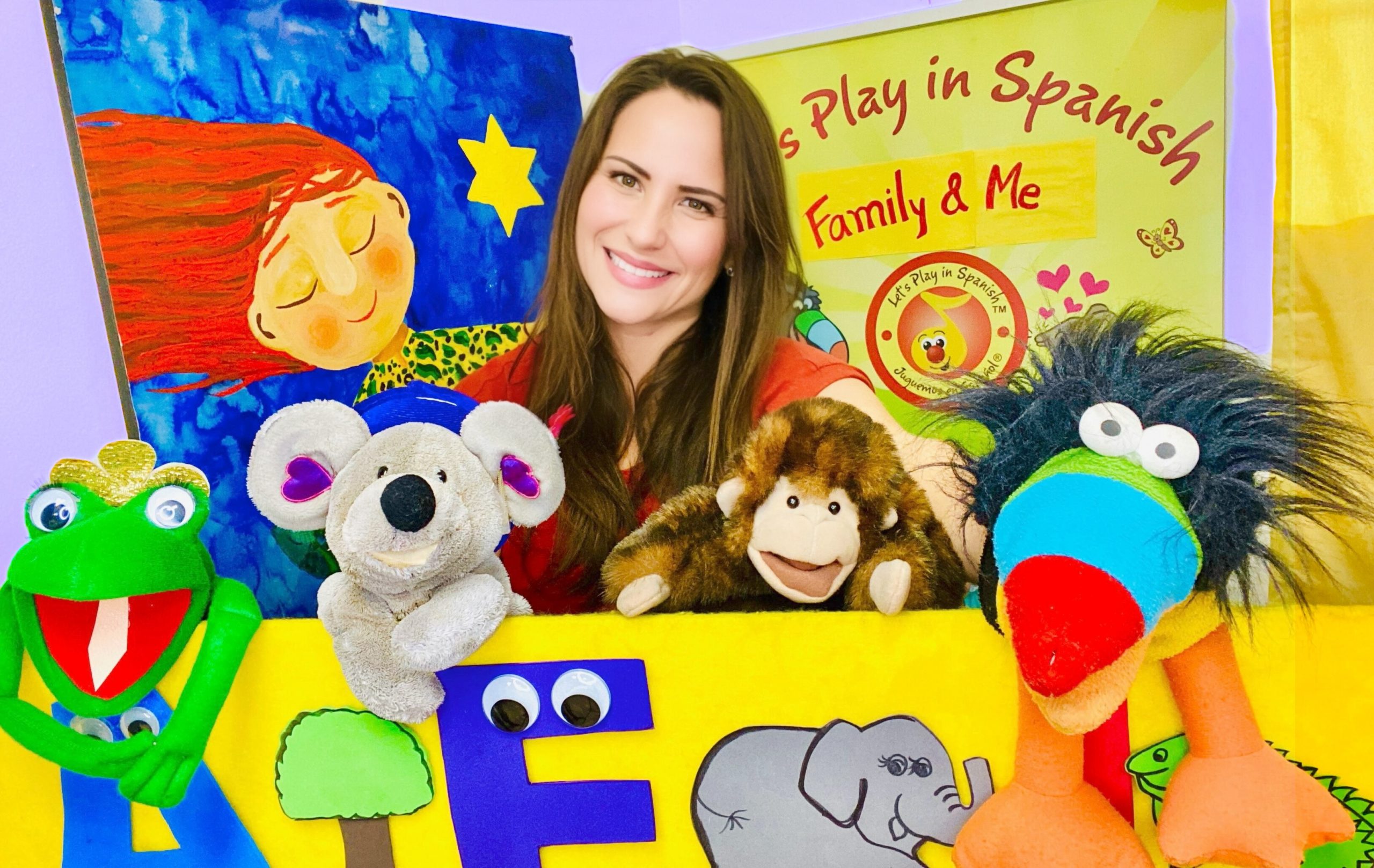 A photo of Susy and her puppets.